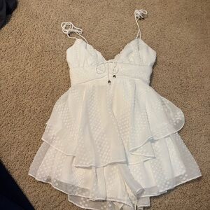 White ruffle romper size medium
